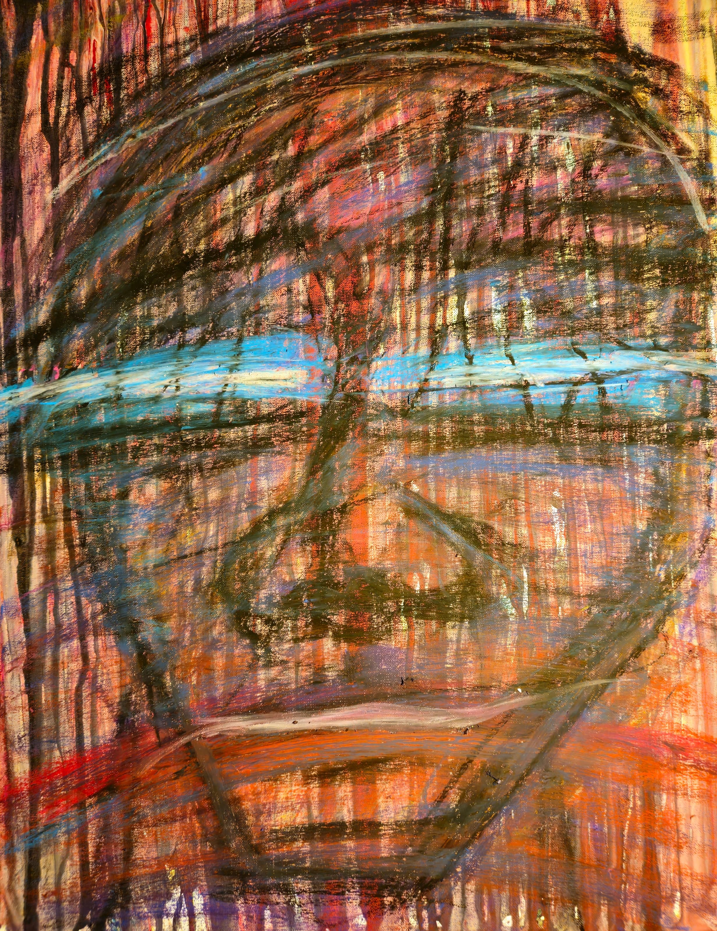 Close-up painted face in orange, red, black and blue, with a turquoise horizontal band crossing the eyes.